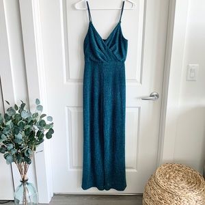 Francesca’s Veena Glitter Surplice Jumpsuit | M